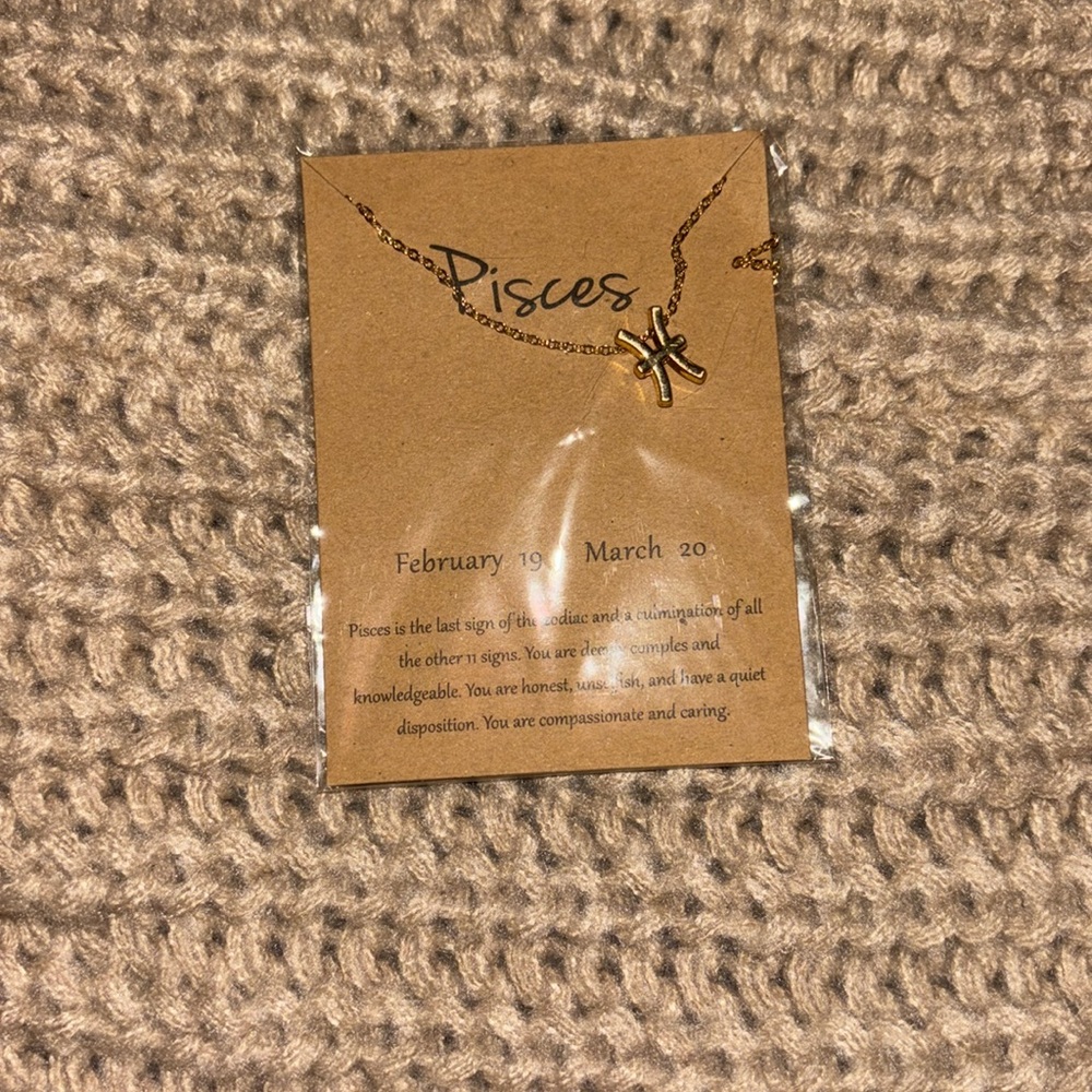 Brand new Pisces necklace